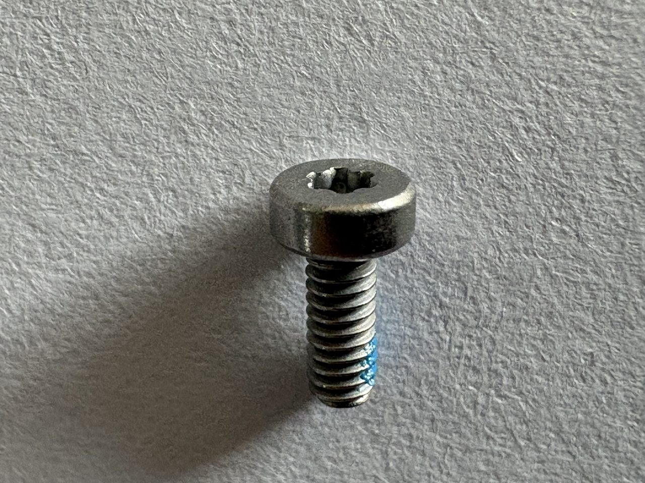 Pre-applied adhesive socket cap screws