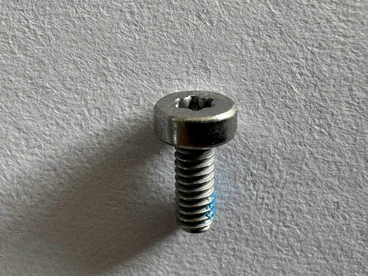 Pre-applied adhesive socket cap screws